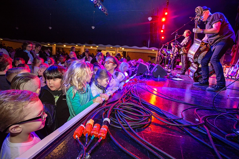 Kids rockin' out at the stage